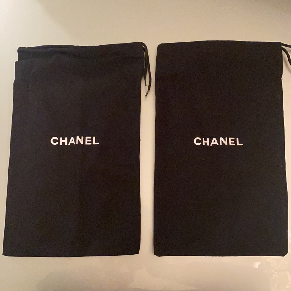CHANEL Brand new pair of classic fabric shoe bags